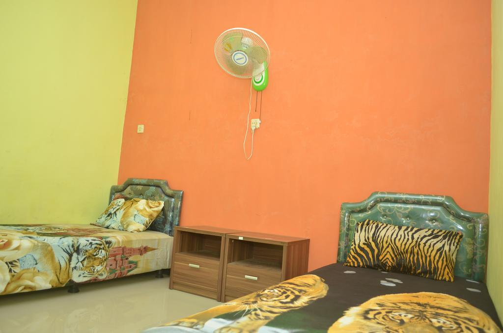 Sritanjung Guest house *